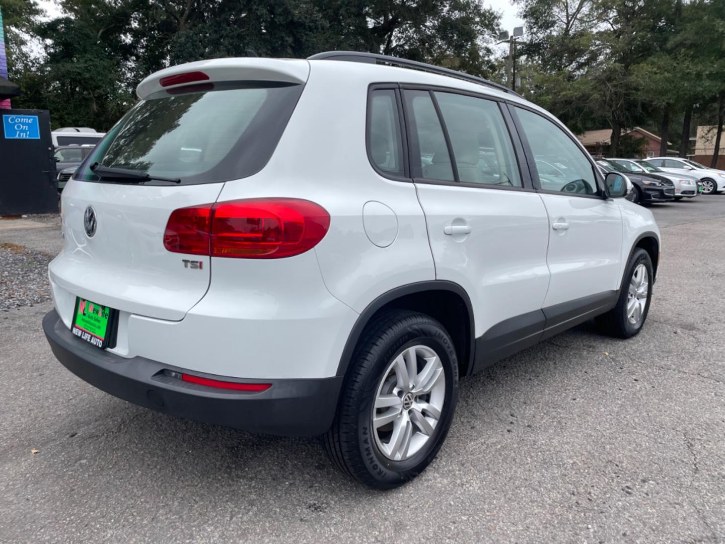 2017 WHITE VOLKSWAGEN TIGUAN S (WVGAV7AX7HK) with an 2.0L engine, Automatic transmission, located at 5103 Dorchester Rd., Charleston, SC, 29418-5607, (843) 767-1122, 36.245171, -115.228050 - Clean Interior with Leather, CD/AUX/USB/Bluetooth, Power Everything (windows, locks, seat, mirrors), Heated Seats, All-weather Mats, Push Button Start, Keyless Entry, Alloy Wheels. Clean CarFax (no accidents reported!) Local Trade-in!! 99k miles Located at New Life Auto Sales! 2023 WINNER for Pos - Photo#6